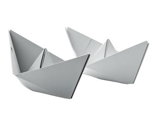 Two handcrafted paper boats, white and subtly shadowed, against a black background