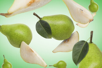 Fresh green pears flying in air on color background