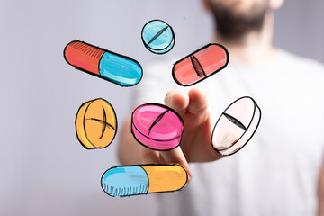 Abstract image of hand interacting with colorful pills and capsules. Perfect for healthcare, medicine, pharmacy, and wellness concepts.