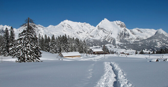 Huts in Sellamatt and Mount Santis in winter, Switzerland.