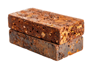 Weathered, rustic red-brown brick atop its mirrored reflection, black backdrop