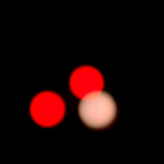 Red Circles Glowing Against Black
