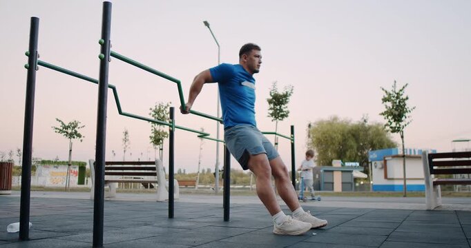 Dynamic Street Workout Engage in Parallel Bar Dips for Enhanced Strength Training and Fitness