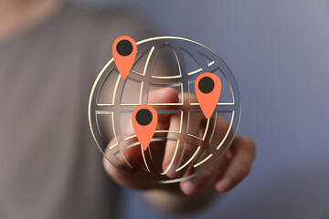 Hand interacts with a digital globe, highlighting key locations.  Perfect for global business, networking, and connectivity concepts.