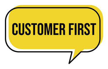 Yellow speech bubble with the phrase customer first in bold black letters