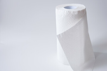Roll of kitchen paper towel isolated on a white background