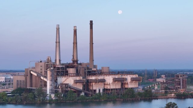 Moon Rises Behind DTE River Rouge Power Plant on Detroit River in Michigan