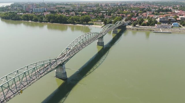 Scenic aerial view of Hungary&rsquo;s M&aacute;ria Val&eacute;ria Bridge, spanning the Danube River with Slovakia visible across the water