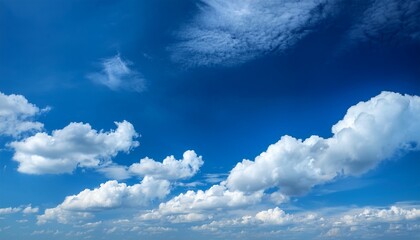 Bright Blue Sky With Fluffy Clouds