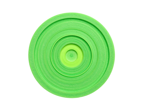 Overhead view of a neon green, circular, layered object with concentric rings
