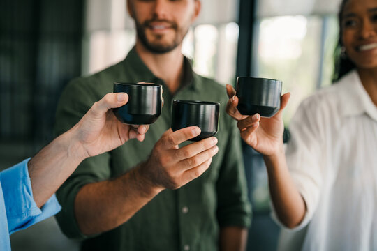 Young multiracial colleagues friends chatting discussing work company policy during coffee break - Powered by Adobe