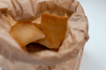 Warm inviting light streams into a private event venue showcasing a beautifully prepared lunch table setting ready for guests to enjoy a delightful dining experience
