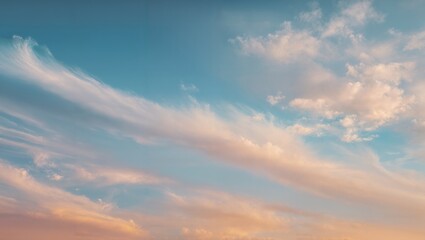 Obraz premium Pastel sunset sky with long wispy cirrus and feathered altocumulus clouds drifting across soft blue and peach gradient horizon calm atmospheric light glow