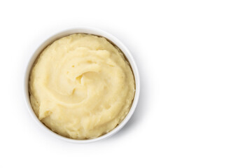Mashed potatoes in white bowl isolated on white background. Top view. Copy space