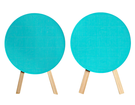 Two turquoise circular tabletop stools with wooden legs, isolated on black