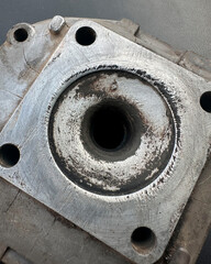 a scratched head of a two stroke scooter piston cylinder under the gasket
