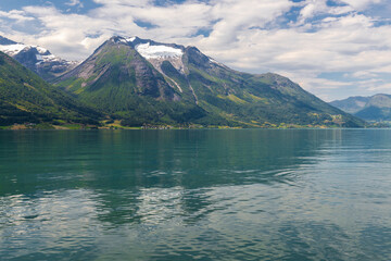 Oppstrynsvatnet is a lake in Stryn Municipality in Vestland county, Norway. It is located about 8 kilometres east of the village of Stryn. 