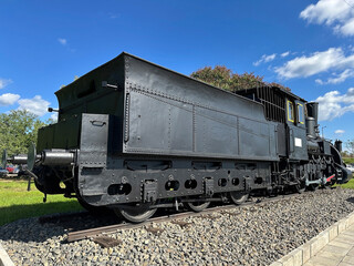 Part of an old locomotive at the railway station