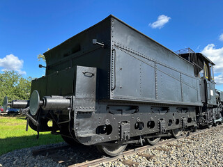 Part of an old locomotive at the railway station