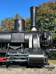Part of an old locomotive at the railway station