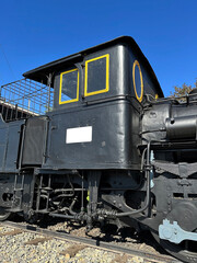 Part of an old locomotive at the railway station