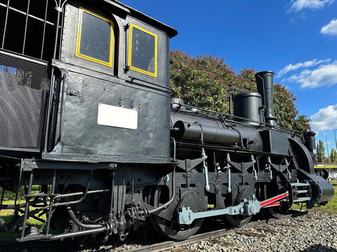 Part of an old locomotive at the railway station