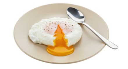 Perfectly poached egg with runny yolk isolated on beige plate, breakfast food photography
