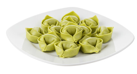 Green tortelloni pasta isolated on a plate, traditional Italian cuisine filled with ricotta and spinach, no background