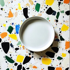 Obraz premium White bowl on colorful terrazzo