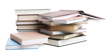 Stacks of many books isolated on white
