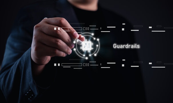 AI guardrails concept. Businessman holding glowing AI chip icon with digital circuit graphics, symbolizing artificial intelligence safety, control, and responsible development in technology. - Powered by Adobe