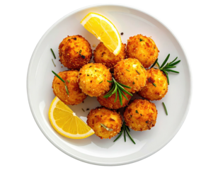 Fried golden-brown balls with garnish, lemon wedges on a white plate