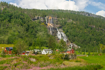 Tvindefossen is a breath-taking waterfall which has a drop of 110 metres with multiple elegant levels and is a very popular tourist attraction. Myths even say that the water is a fountain of youth. Th