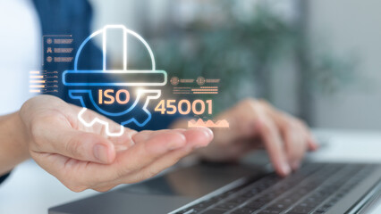 Artificial intelligence with ISO 45001 occupational health and safety management concept, digital helmet icon for workplace safety, risk prevention and compliance.