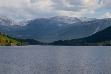 A beautiful Summer day in the UNESCO-listed Naeroyfjord in Norway, which is the most beautiful and wildest arm of the Sognefjord with at the end the picturesque village of Gudvangen, where you can sta