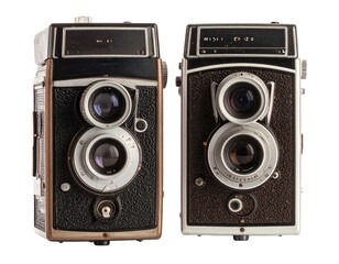 Two classic twin-lens reflex cameras are viewed front-on, showing their lenses