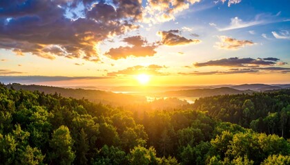 Panoramic sunset over a forested valley