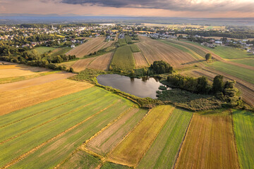 Aerial View of Countryside Fields and Pond at Sunset, Poland &ndash; Rural Landscape