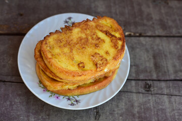 French toast  and white cheese. Rustic breakfast  made from deep fried   bread   with organic free range   eggs