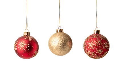 Three red and gold christmas ornaments hanging on thin strings isolated on transparent background