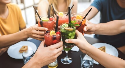 Cheering with cocktails friends celebrating summer happy hour fun