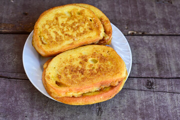 French toast  and white cheese. Rustic breakfast  made from deep fried   bread   with organic free range   eggs