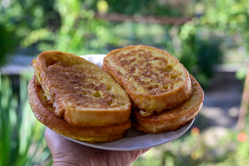 French toast  and white cheese. Rustic breakfast  made from deep fried   bread   with organic free range   eggs