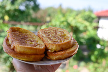French toast  and white cheese. Rustic breakfast  made from deep fried   bread   with organic free range   eggs