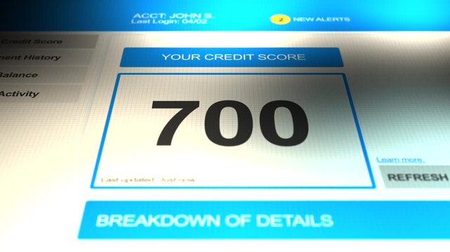 Camera pans across a credit score of 700 on generic website