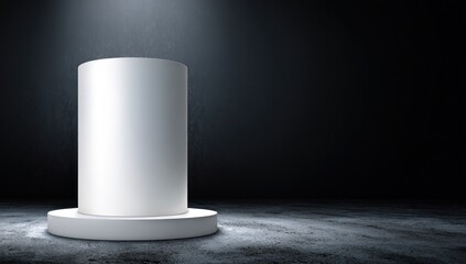 A blank, cylindrical display pedestal stands on a dark, textured floor, illuminated by a spotlight.