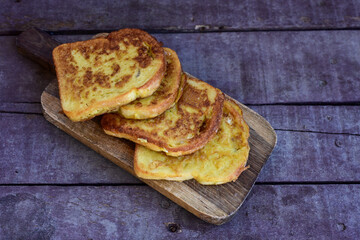 French toast  and white cheese. Rustic breakfast  made from deep fried   bread   with organic free range   eggs