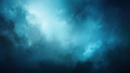 Obraz premium A dramatic abstract background featuring swirling deep blue and cyan textures, resembling luminous clouds, smoke, or underwater depths with a bright ethereal glow, blurred blue background
