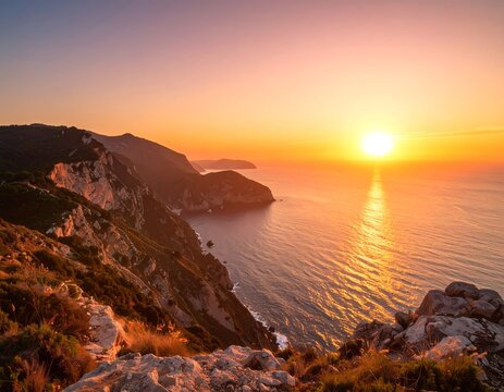 Panoramic sunset view over a rocky coastline and ocean - Powered by Adobe
