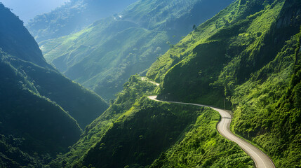 Winding road through lush mountain valley